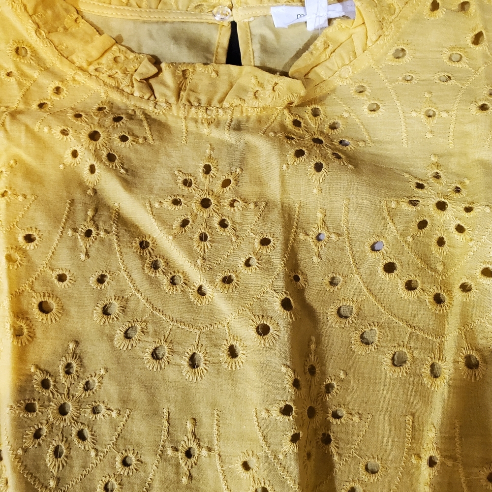 Yellow eyelit pattern sleeveless top
